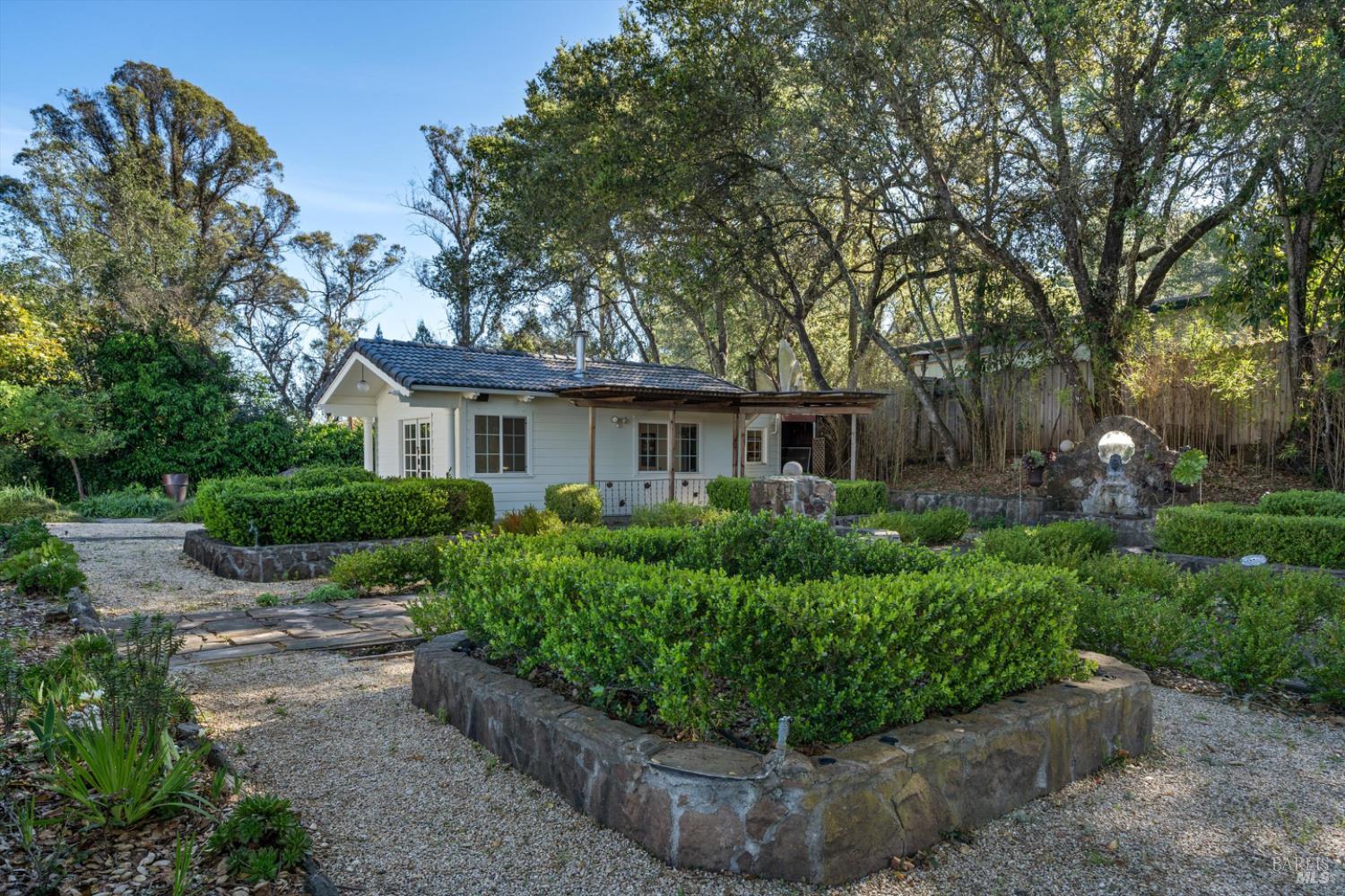 1236 North Fitch Mountain Road Healdsburg, CA 95448 - Photo 58 of 70 a front view of a house with a yard