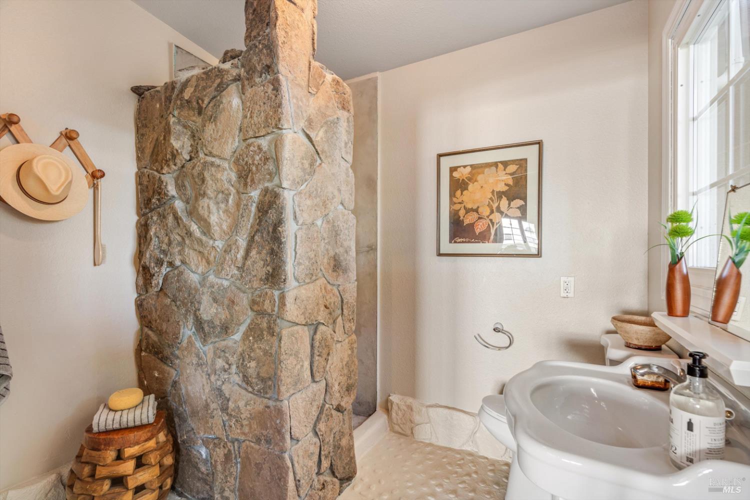 1236 North Fitch Mountain Road Healdsburg, CA 95448 - Photo 63 of 70 a bathroom with a sink toilet and shower