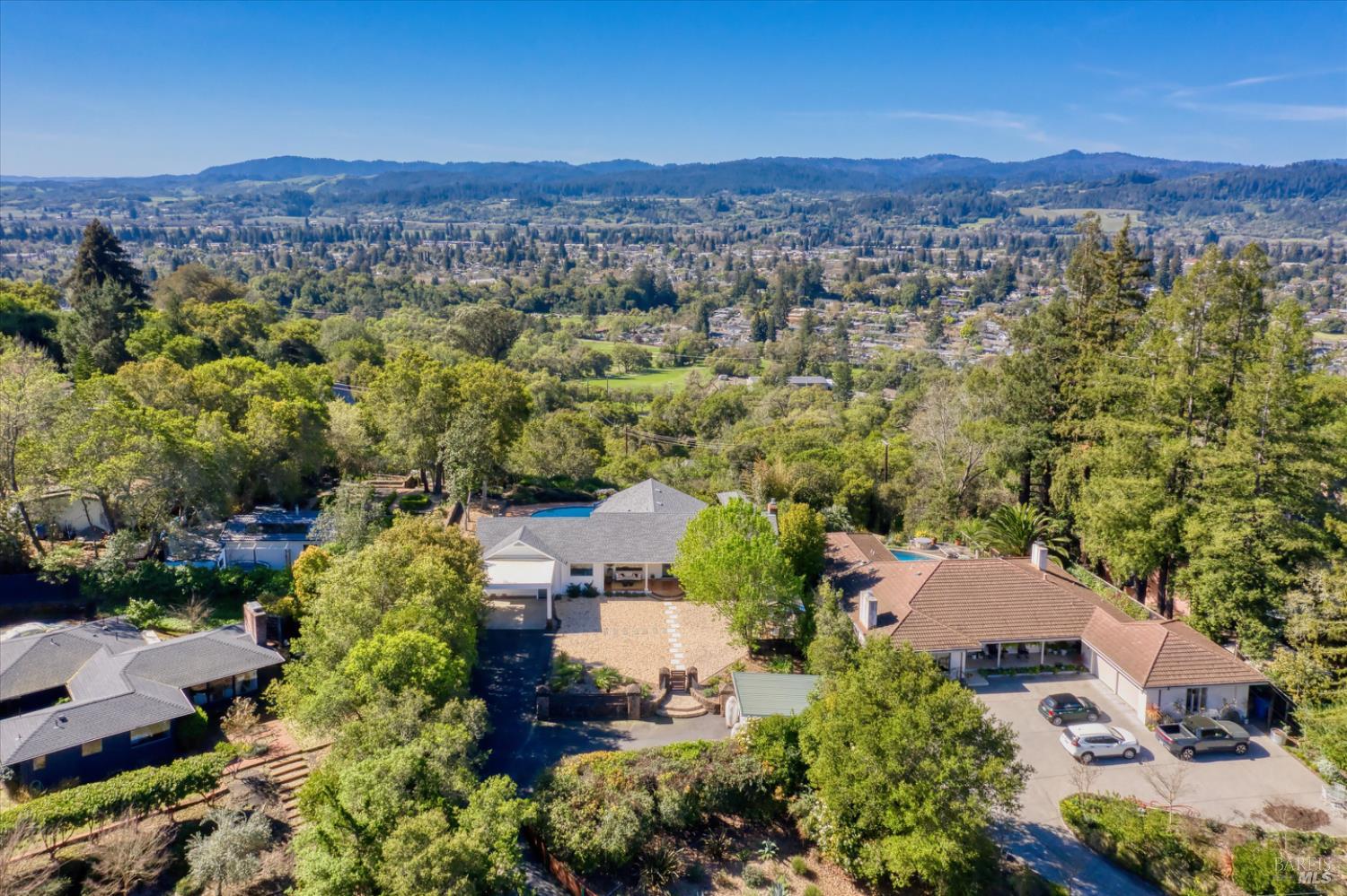 1236 North Fitch Mountain Road Healdsburg, CA 95448 - Photo 64 of 70 an aerial view of a city with lots of residential buildings