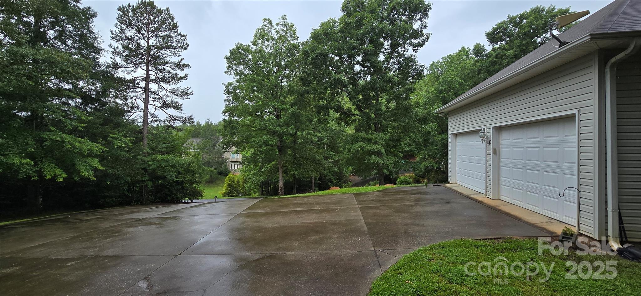 221 Flat Branch Trail Mill Spring, NC 28756 - Photo 6 of 32 a view of a house with a yard
