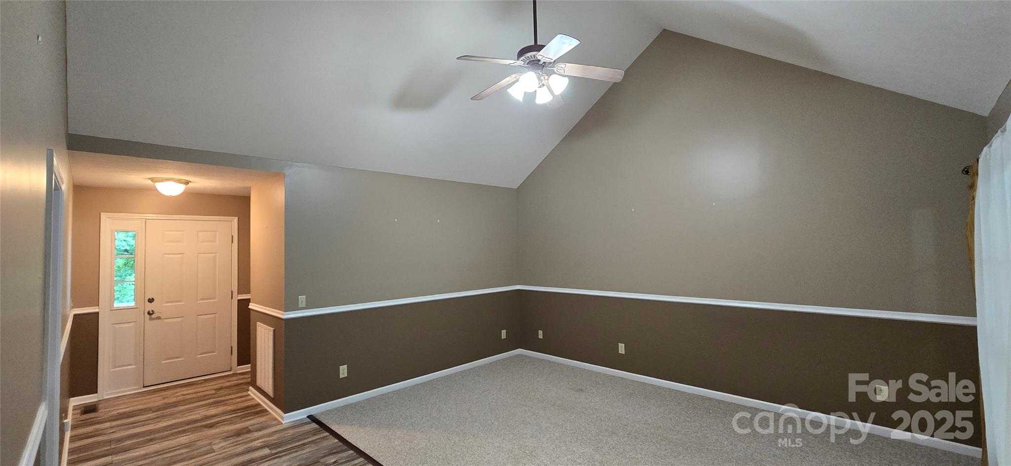 221 Flat Branch Trail Mill Spring, NC 28756 - Photo 10 of 32 wooden floor in an empty room with a window