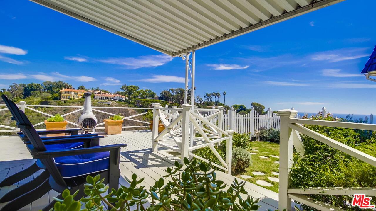 29500 Heathercliff Road, Unit 119 Malibu, CA 90265 - Photo 3 of 47 a view of a balcony with chairs