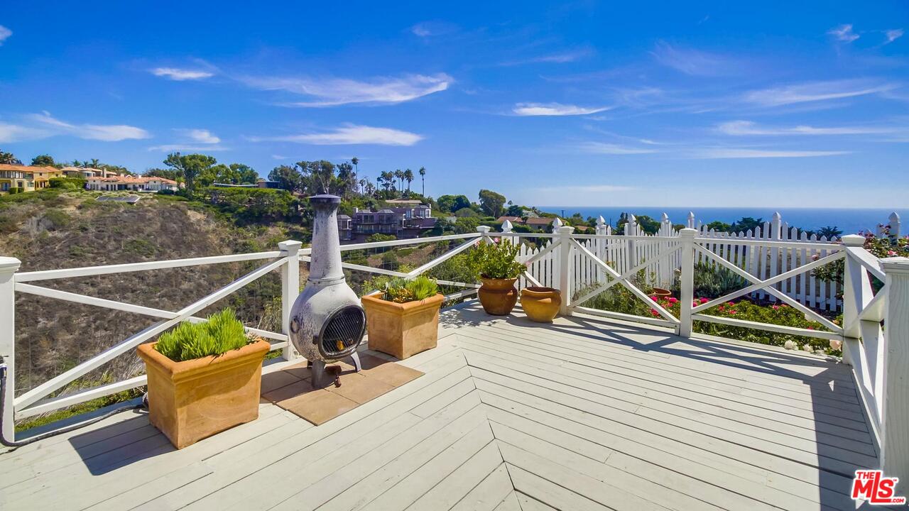 29500 Heathercliff Road, Unit 119 Malibu, CA 90265 - Photo 34 of 47 a view of a balcony with chairs