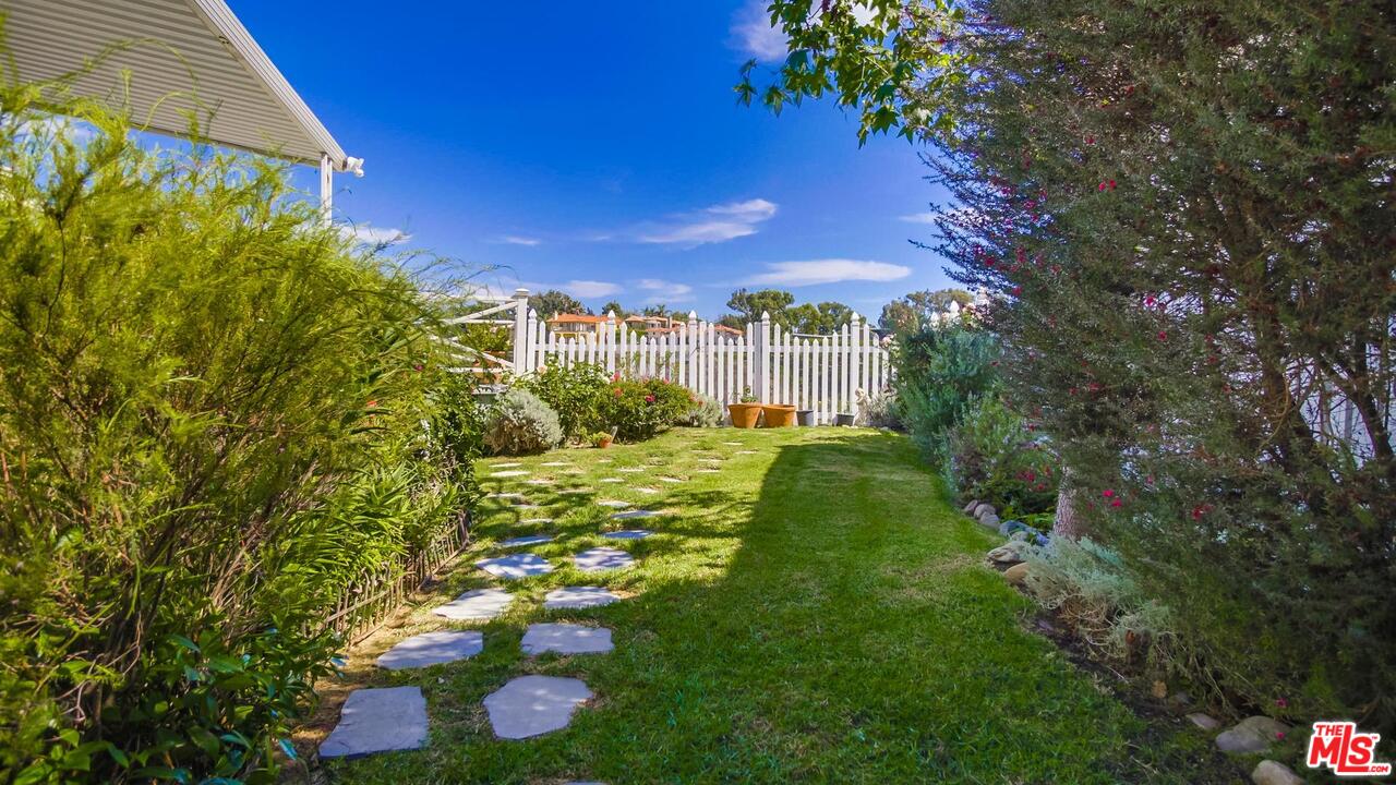 29500 Heathercliff Road, Unit 119 Malibu, CA 90265 - Photo 37 of 47 a view of yard with green space