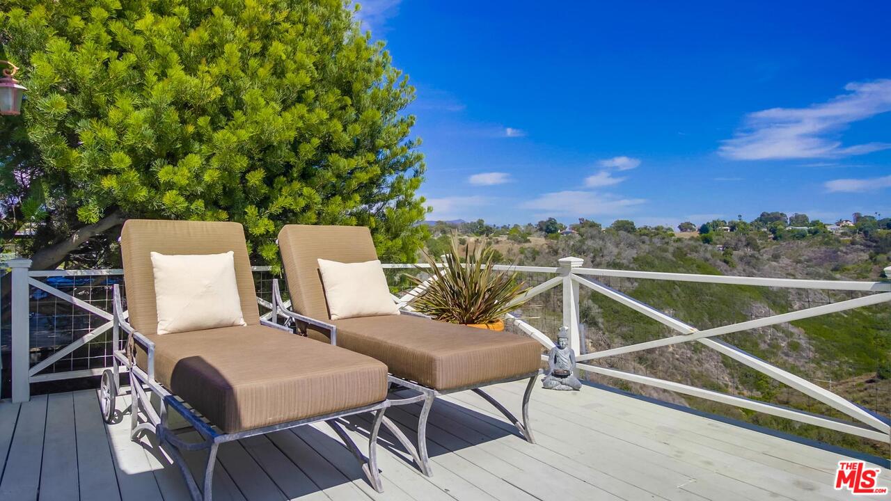29500 Heathercliff Road, Unit 119 Malibu, CA 90265 - Photo 44 of 47 a view of a balcony with chairs