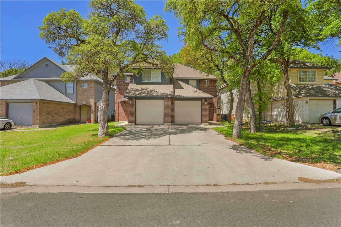9614 Nightjar Drive, Unit A Austin, TX 78748 - Photo 2 of 34 front view of house with a yard