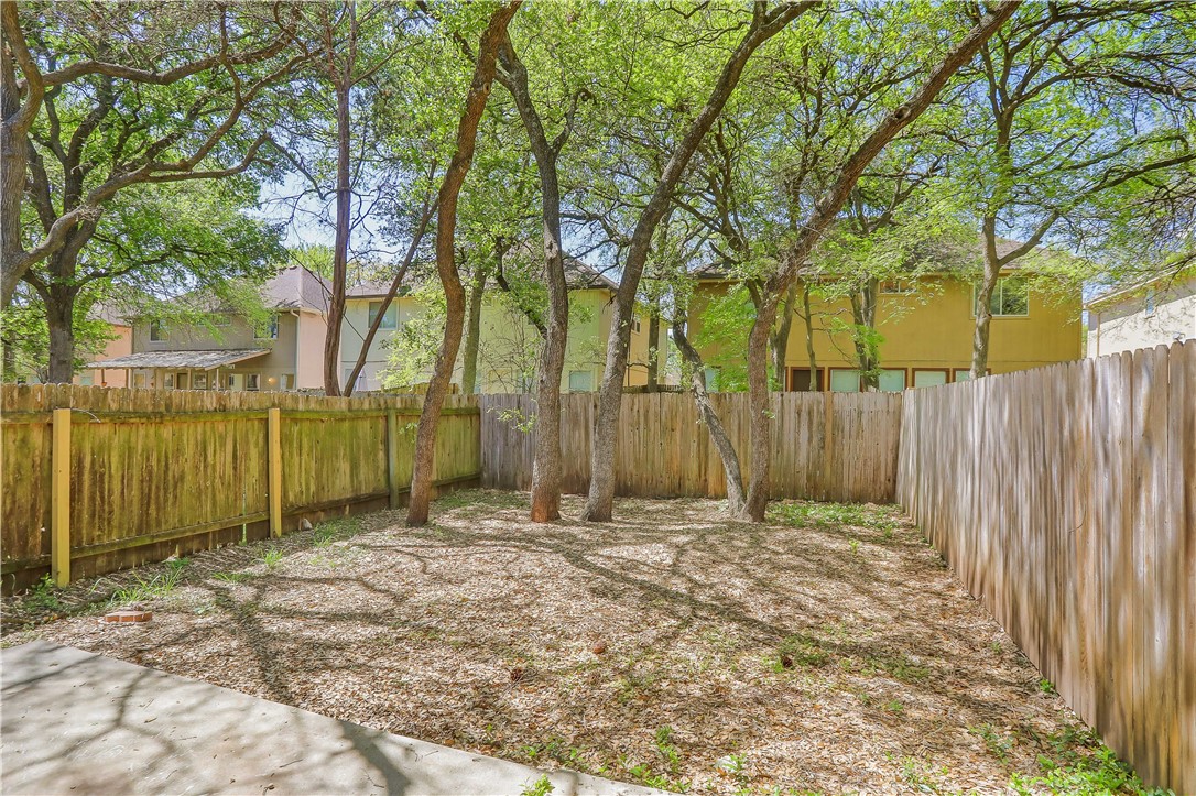 9614 Nightjar Drive, Unit A Austin, TX 78748 - Photo 32 of 34 a view of a backyard