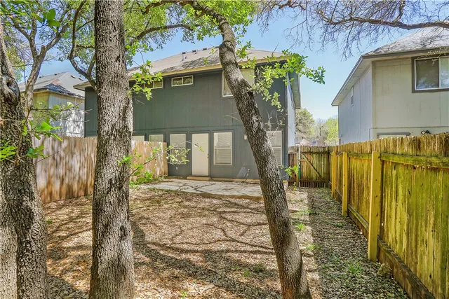 a view of a street along with trees