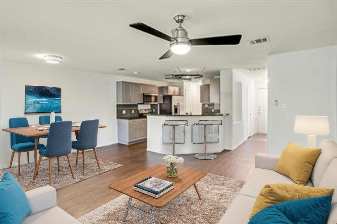 9614 Nightjar Drive, Unit A Austin, TX 78748 - Photo 8 of 34 a living room with kitchen island furniture and a kitchen view
