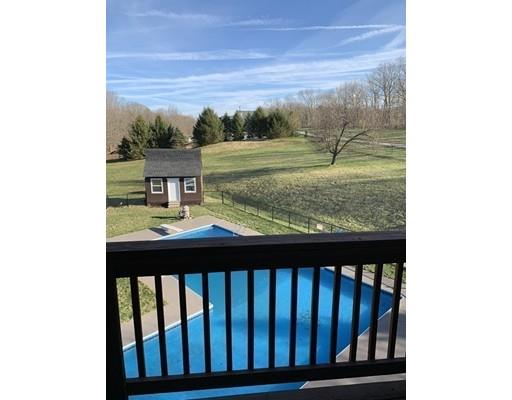205 Podunk Road Sturbridge, MA 01566 - Photo 18 of 30 a view of a balcony with an outdoor space