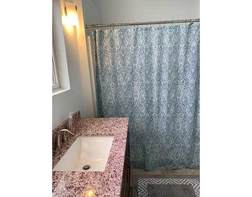 205 Podunk Road Sturbridge, MA 01566 - Photo 20 of 30 a bathroom with a sink and a mirror