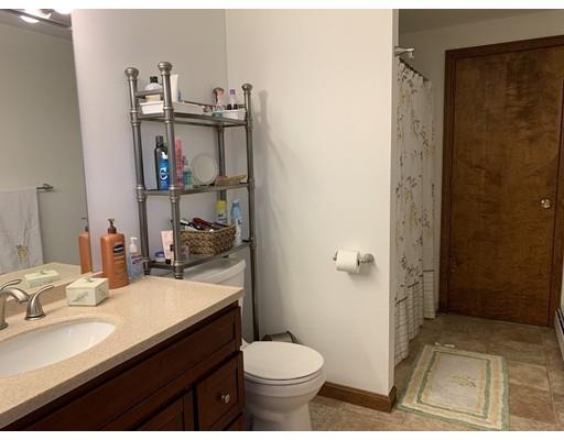 205 Podunk Road Sturbridge, MA 01566 - Photo 23 of 30 a bathroom with a sink toilet and shower
