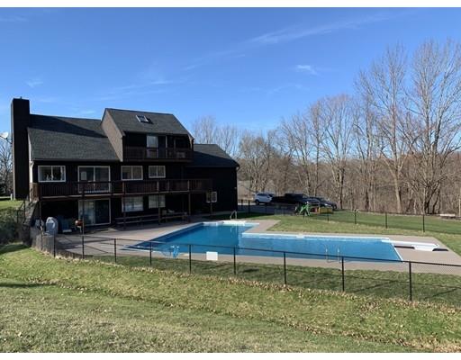 205 Podunk Road Sturbridge, MA 01566 - Photo 27 of 30 a view of a house with a yard