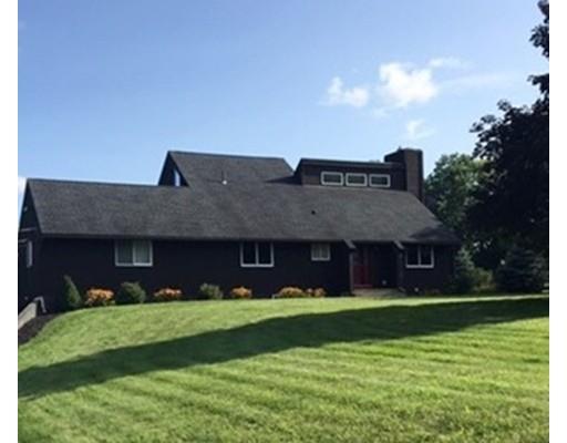 205 Podunk Road Sturbridge, MA 01566 - Photo 30 of 30 a front view of a house with a garden