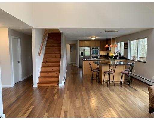 205 Podunk Road Sturbridge, MA 01566 - Photo 4 of 30 a view of a dining room with furniture window and wooden floor