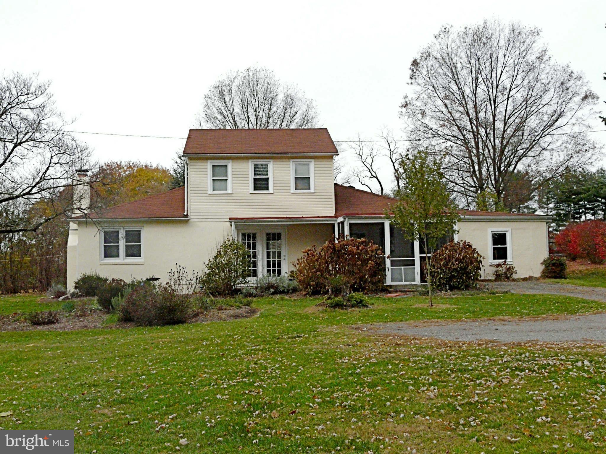3009 Paper Mill Road Phoenix, MD 21131 - Photo 1 of 30 a front view of a house with a yard