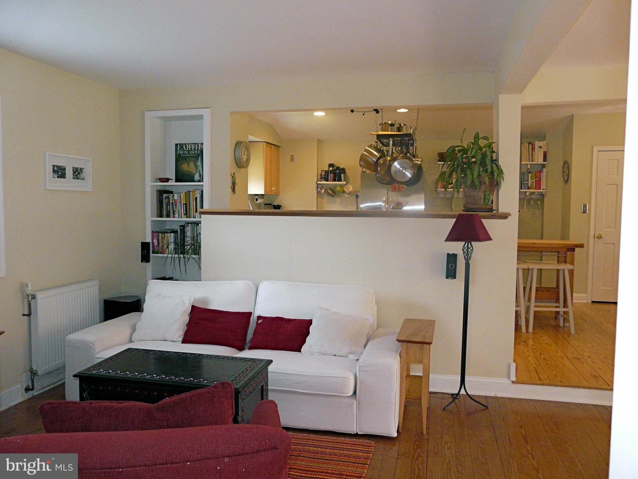 3009 Paper Mill Road Phoenix, MD 21131 - Photo 21 of 30 a living room with furniture and wooden floor