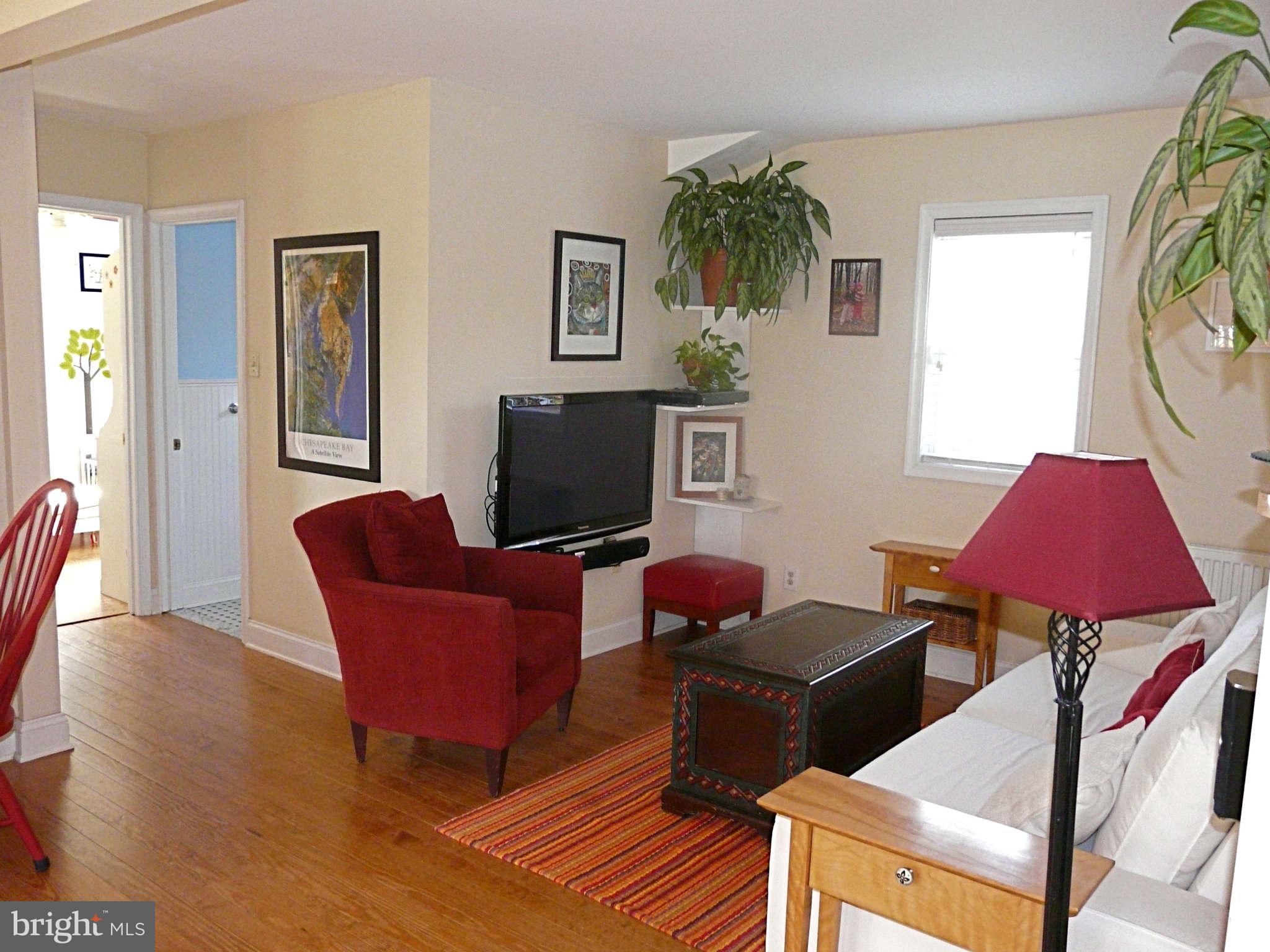 3009 Paper Mill Road Phoenix, MD 21131 - Photo 22 of 30 a living room with furniture and a flat screen tv