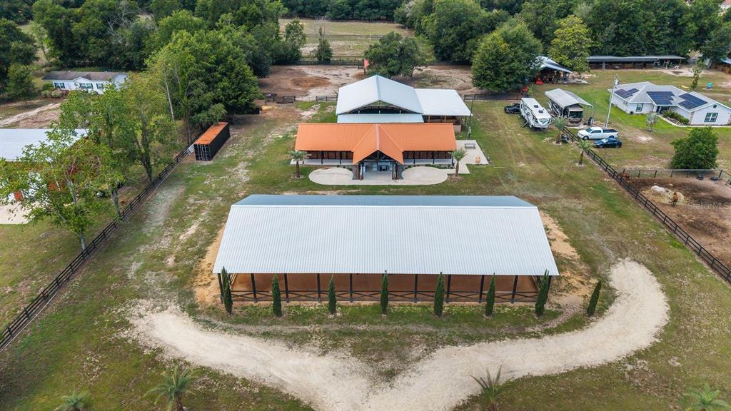 16392 Northeast Jacksonville Road Citra, FL 32113 - Photo 9 of 44 an aerial view of a house with a yard