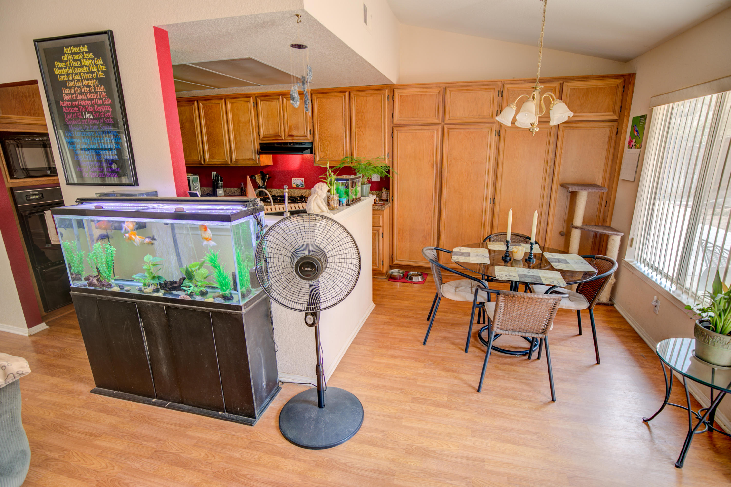 3050 Quarry Road Palmdale, CA 93550 - Photo 6 of 21 a view of a dining room with furniture window and outside view