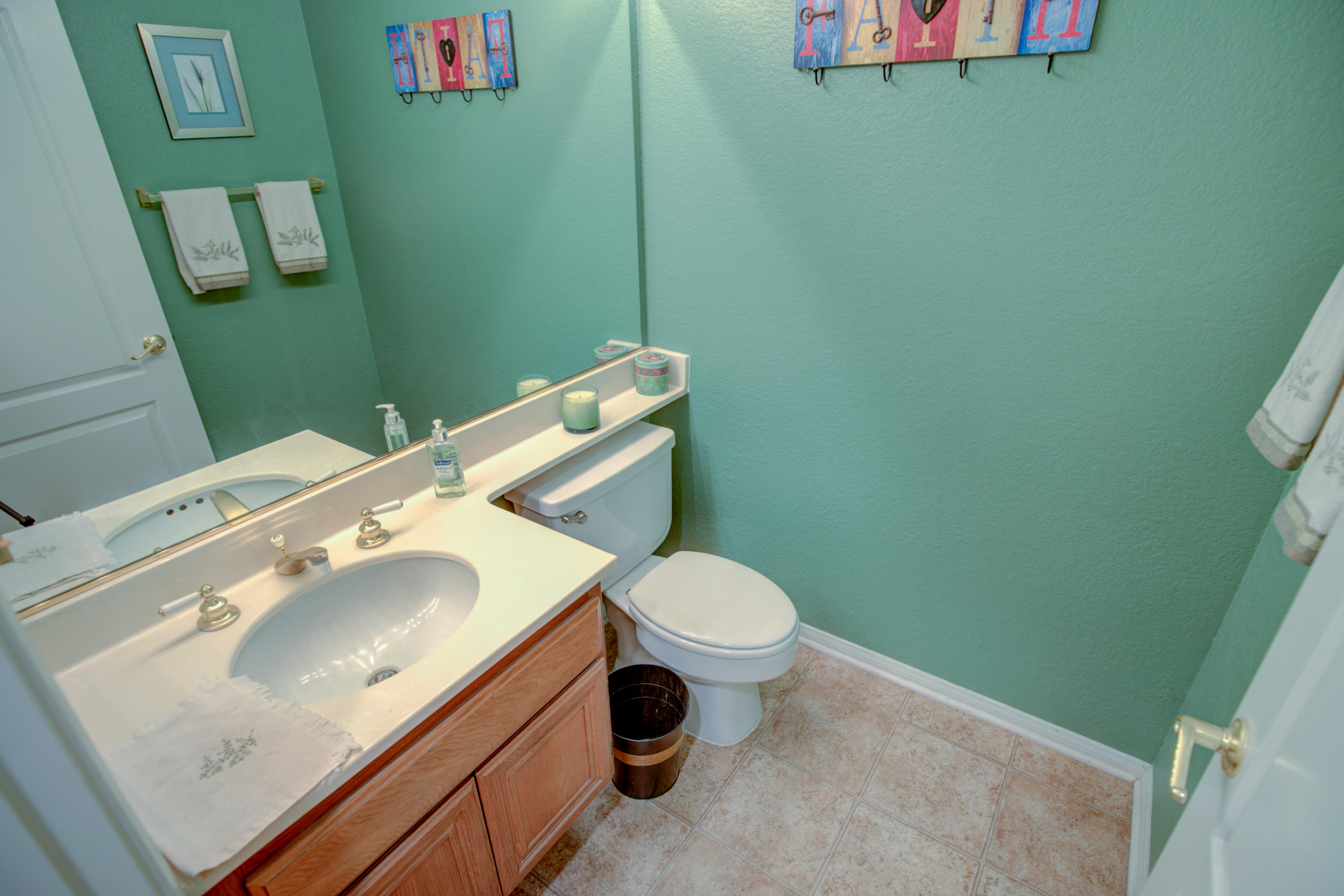 3050 Quarry Road Palmdale, CA 93550 - Photo 10 of 21 a bathroom with a sink and a toilet