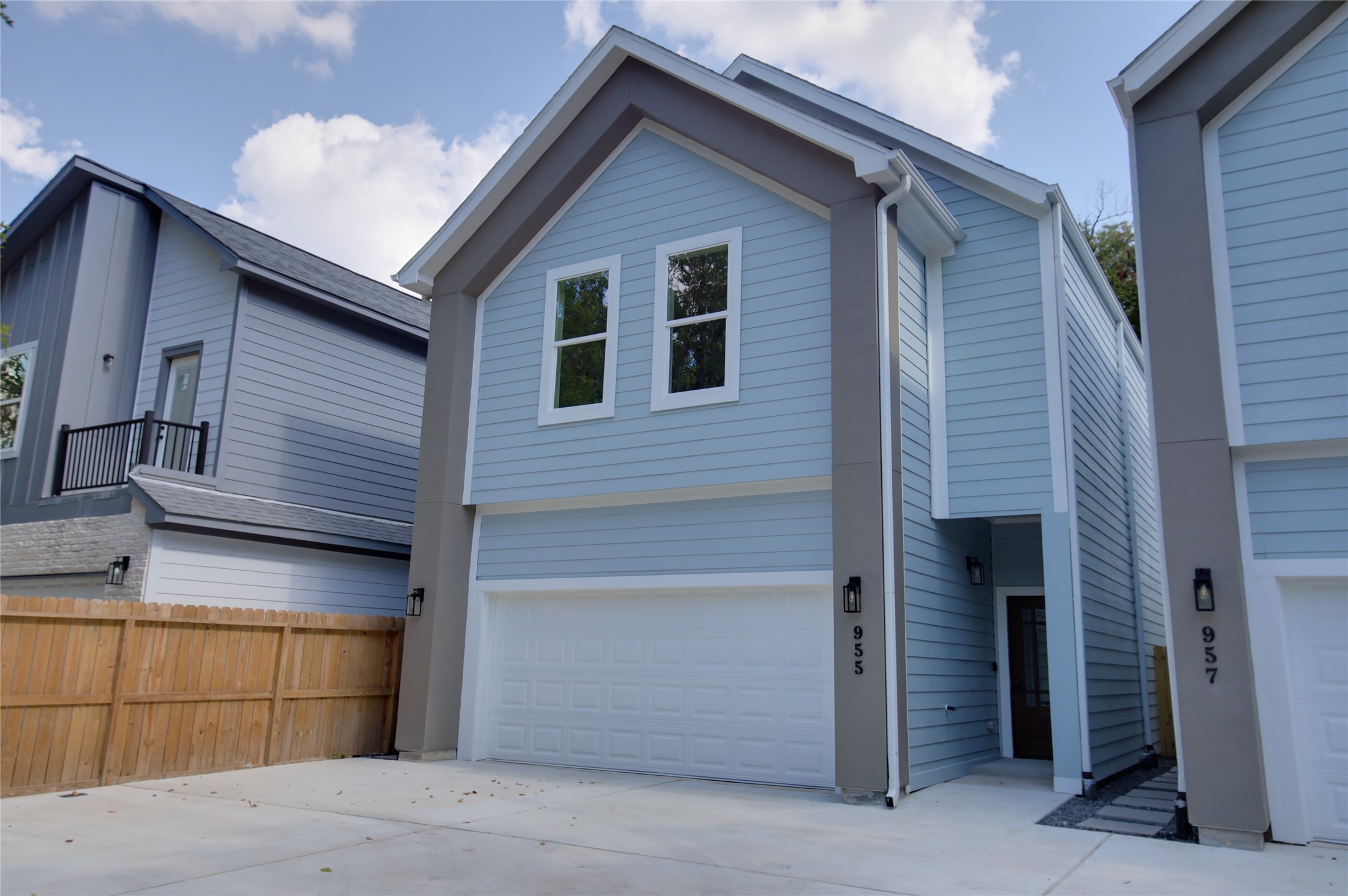 955 Ringold Street Houston, TX 77088 - Photo 3 of 48 a front view of a house with a garage