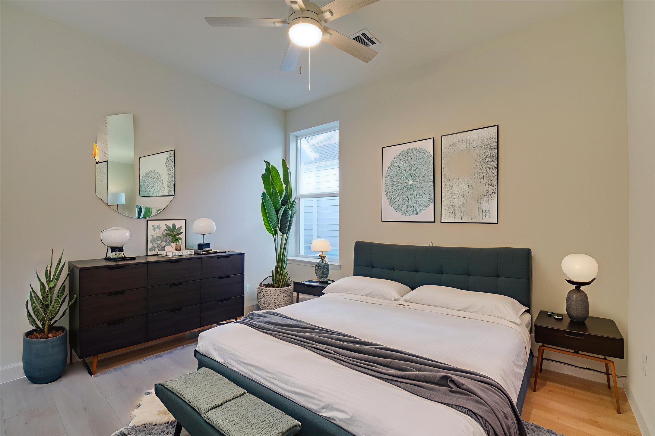 955 Ringold Street Houston, TX 77088 - Photo 35 of 48 a bedroom with a bed and a table