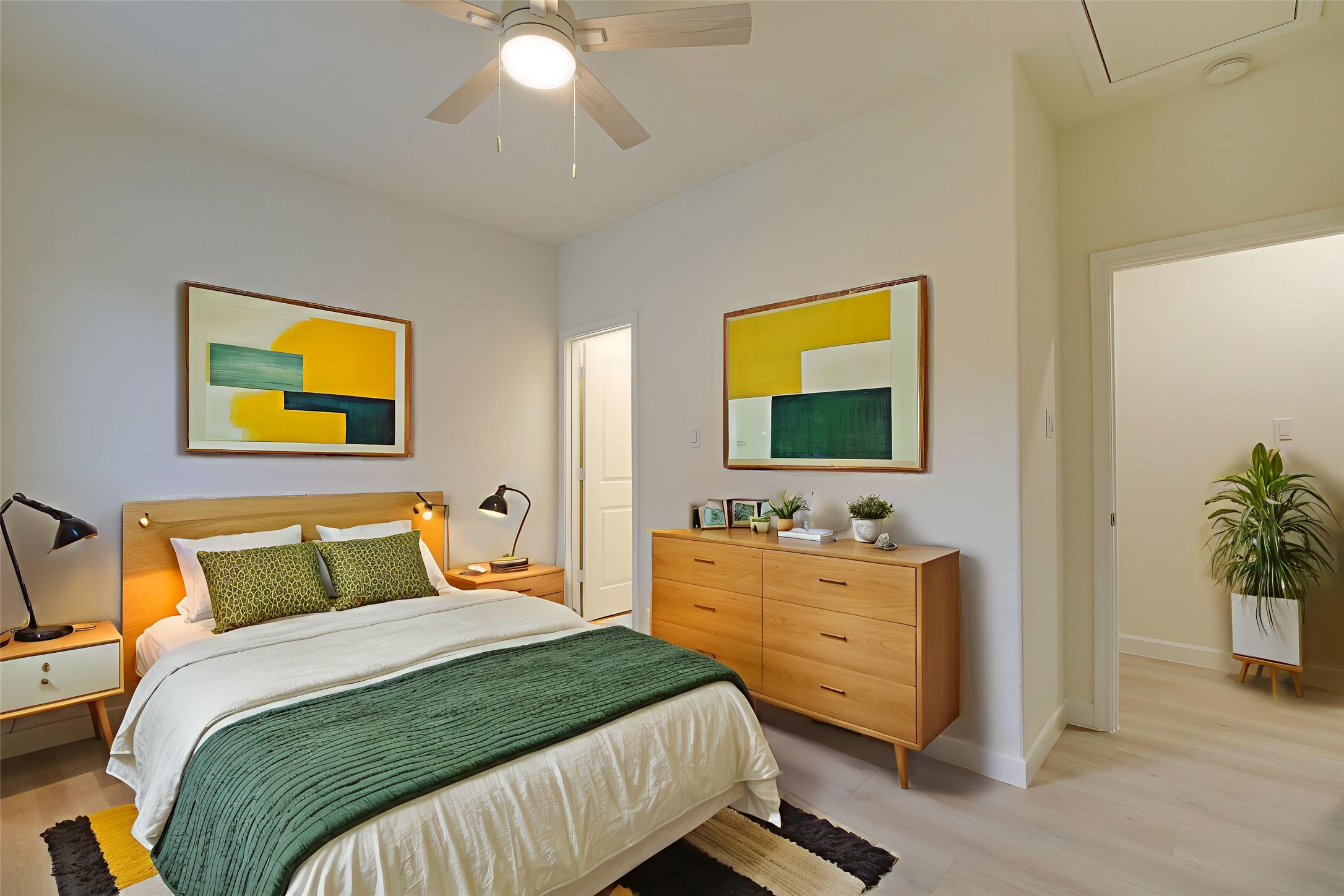 955 Ringold Street Houston, TX 77088 - Photo 39 of 48 a bedroom with a bed and a flat screen tv