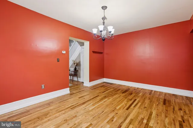a view of livingroom with hardwood floor and ceiling fan
