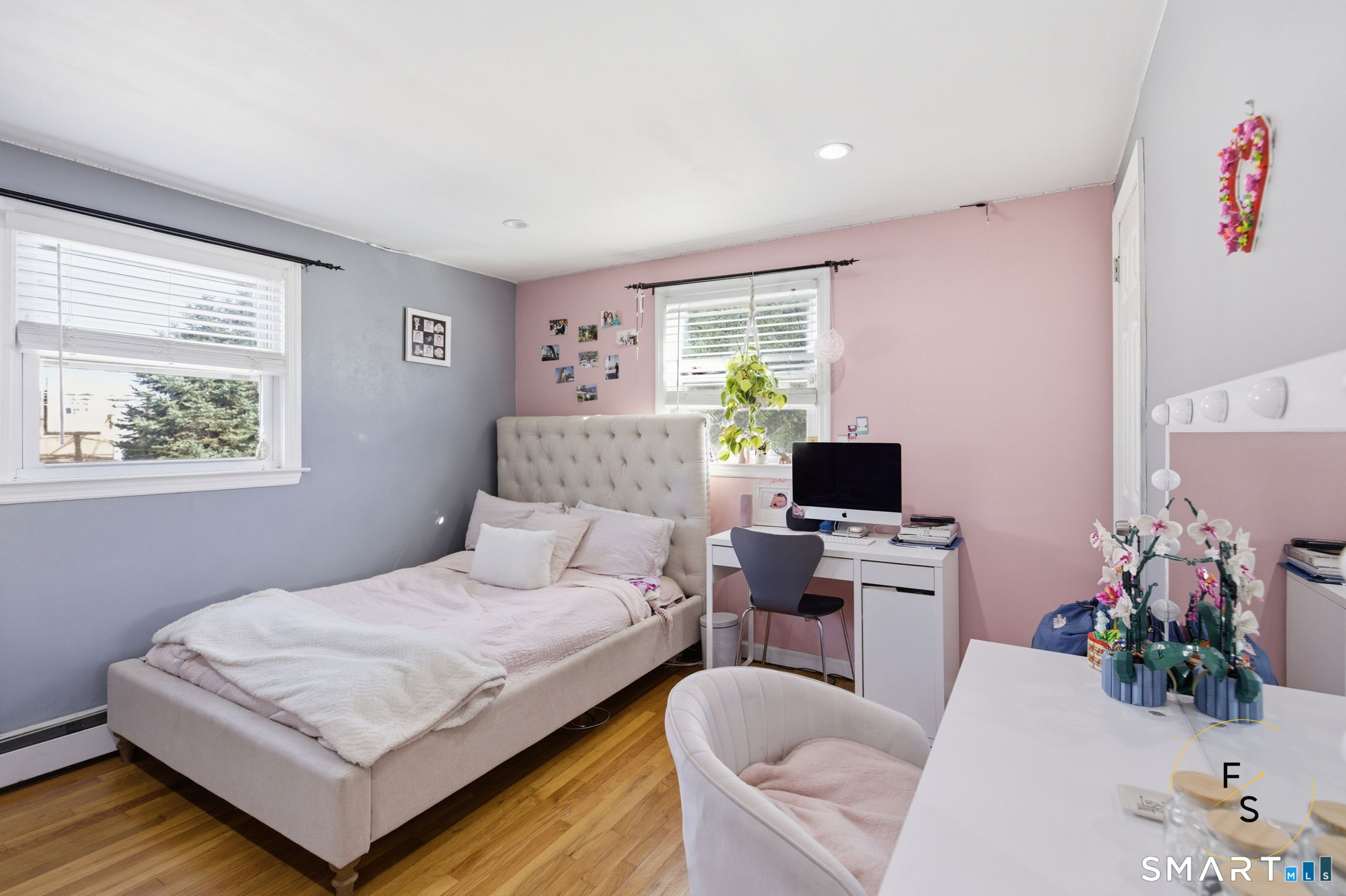 1 Phillips Street, Unit 4 Norwalk, CT 06850 - Photo 11 of 35 a bedroom with a bed window and a table