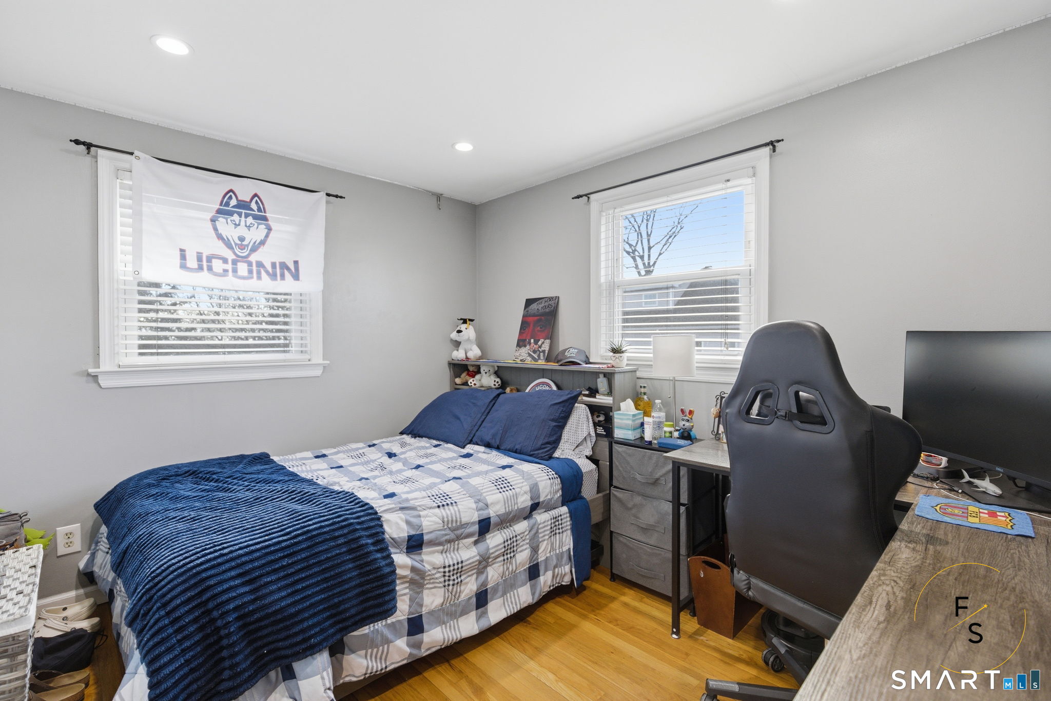 1 Phillips Street, Unit 4 Norwalk, CT 06850 - Photo 15 of 35 a bedroom with a bed and a window