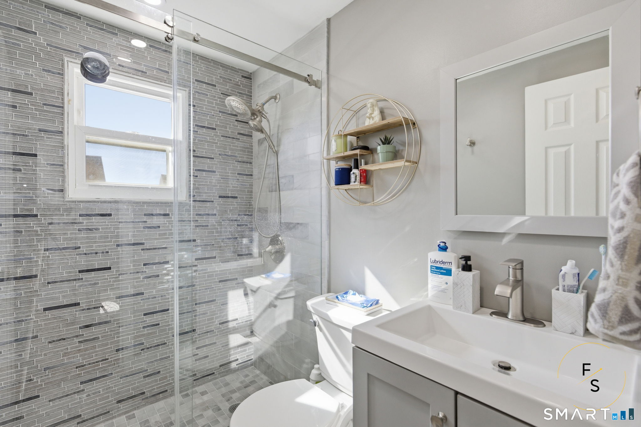1 Phillips Street, Unit 4 Norwalk, CT 06850 - Photo 17 of 35 a bathroom with a sink toilet and shower