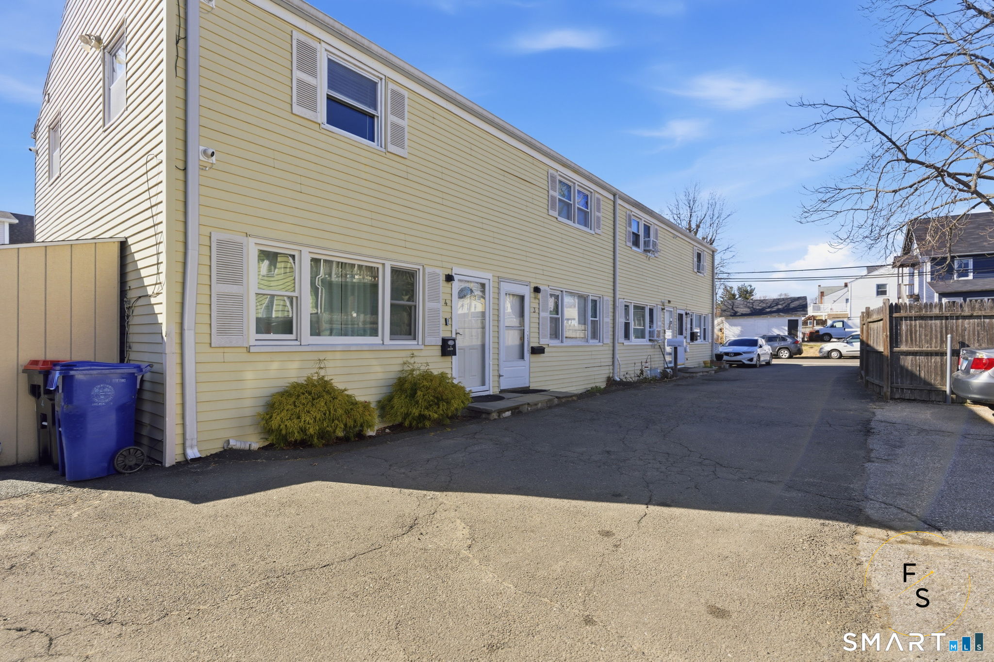 1 Phillips Street, Unit 4 Norwalk, CT 06850 - Photo 2 of 35 a view of a street with cars