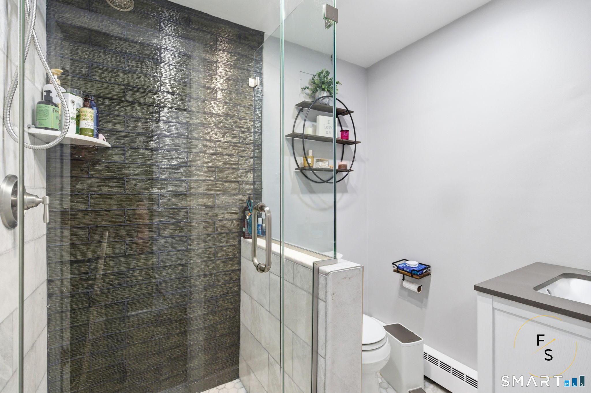 1 Phillips Street, Unit 4 Norwalk, CT 06850 - Photo 23 of 35 a bathroom with a shower a toilet and a sink