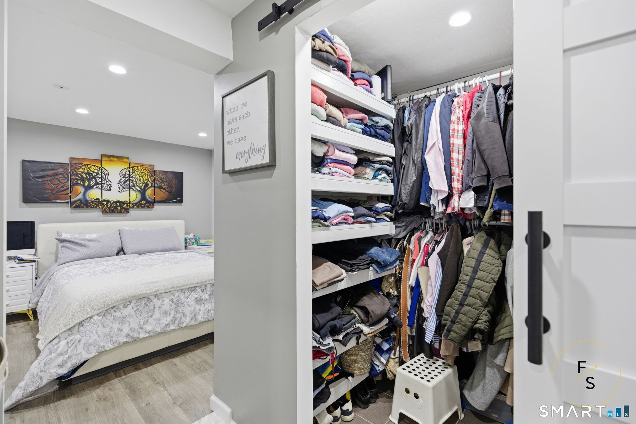 1 Phillips Street, Unit 4 Norwalk, CT 06850 - Photo 24 of 35 a view of walk in closet with clothes and shoes