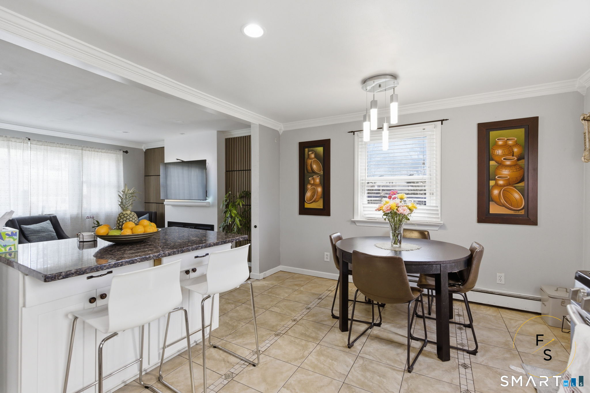 1 Phillips Street, Unit 4 Norwalk, CT 06850 - Photo 3 of 35 a view of a dining room with furniture and a chandelier