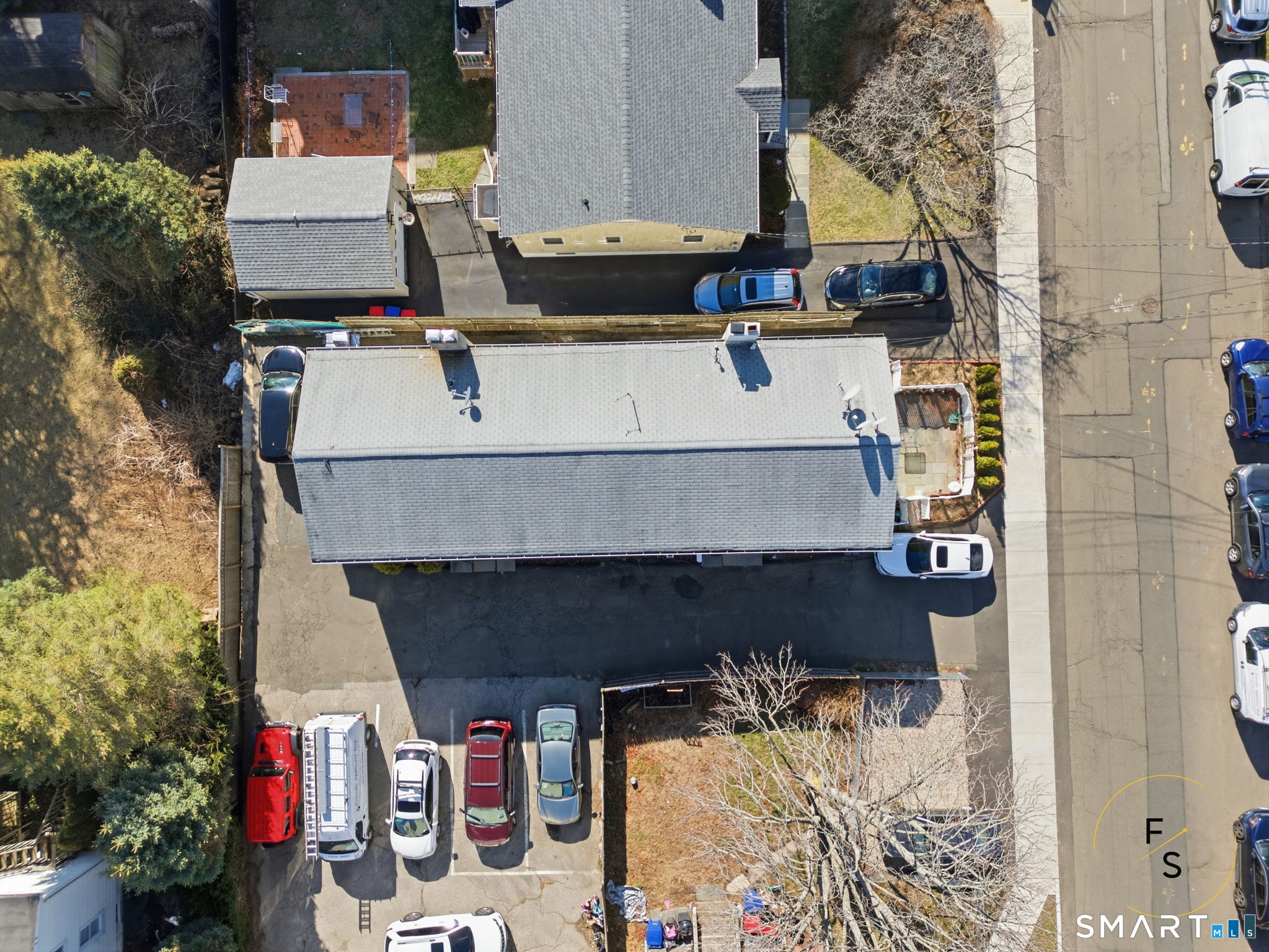 1 Phillips Street, Unit 4 Norwalk, CT 06850 - Photo 31 of 35 a aerial view of a house with large trees