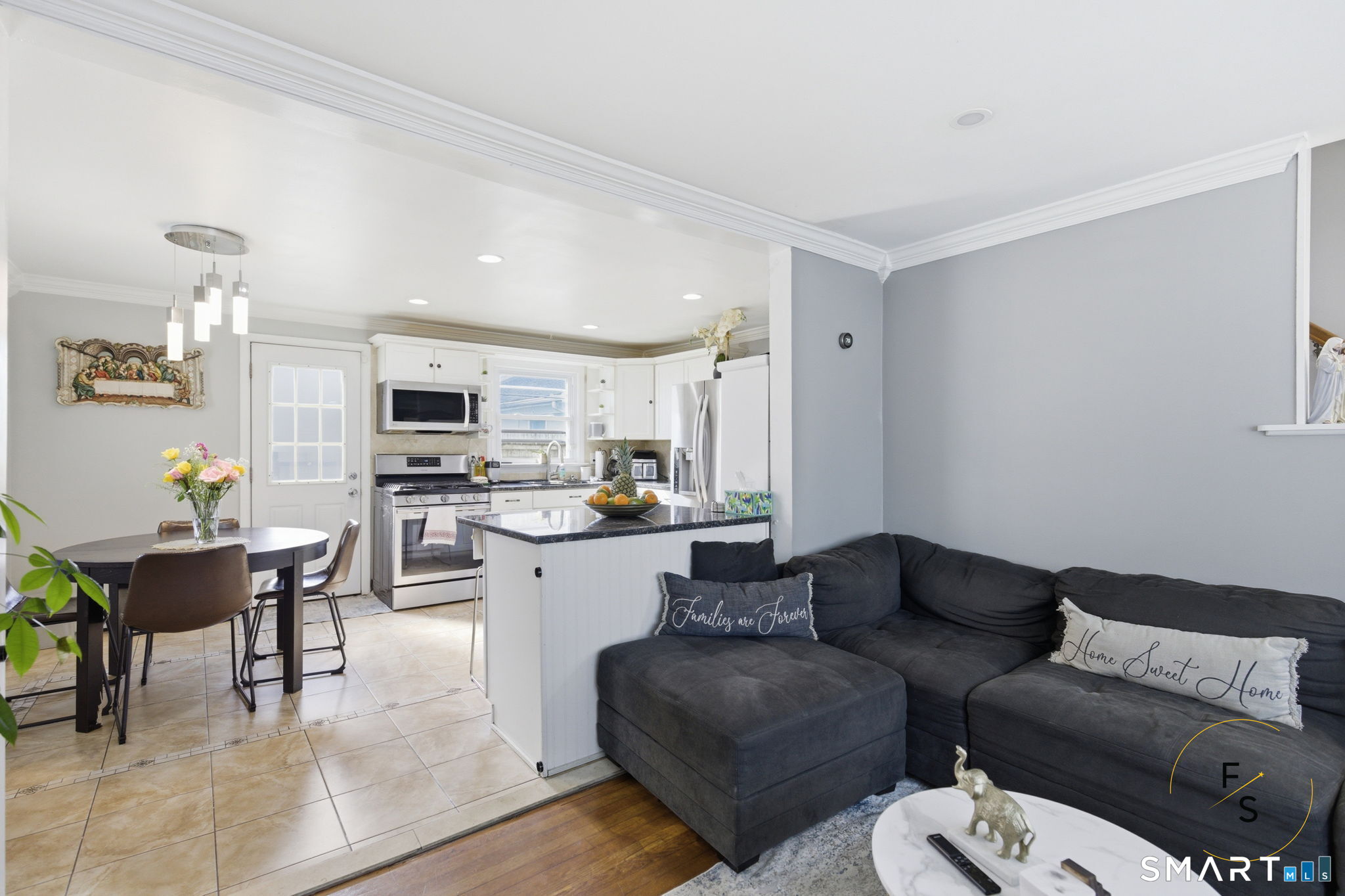 1 Phillips Street, Unit 4 Norwalk, CT 06850 - Photo 8 of 35 a living room with furniture kitchen view and a dining table