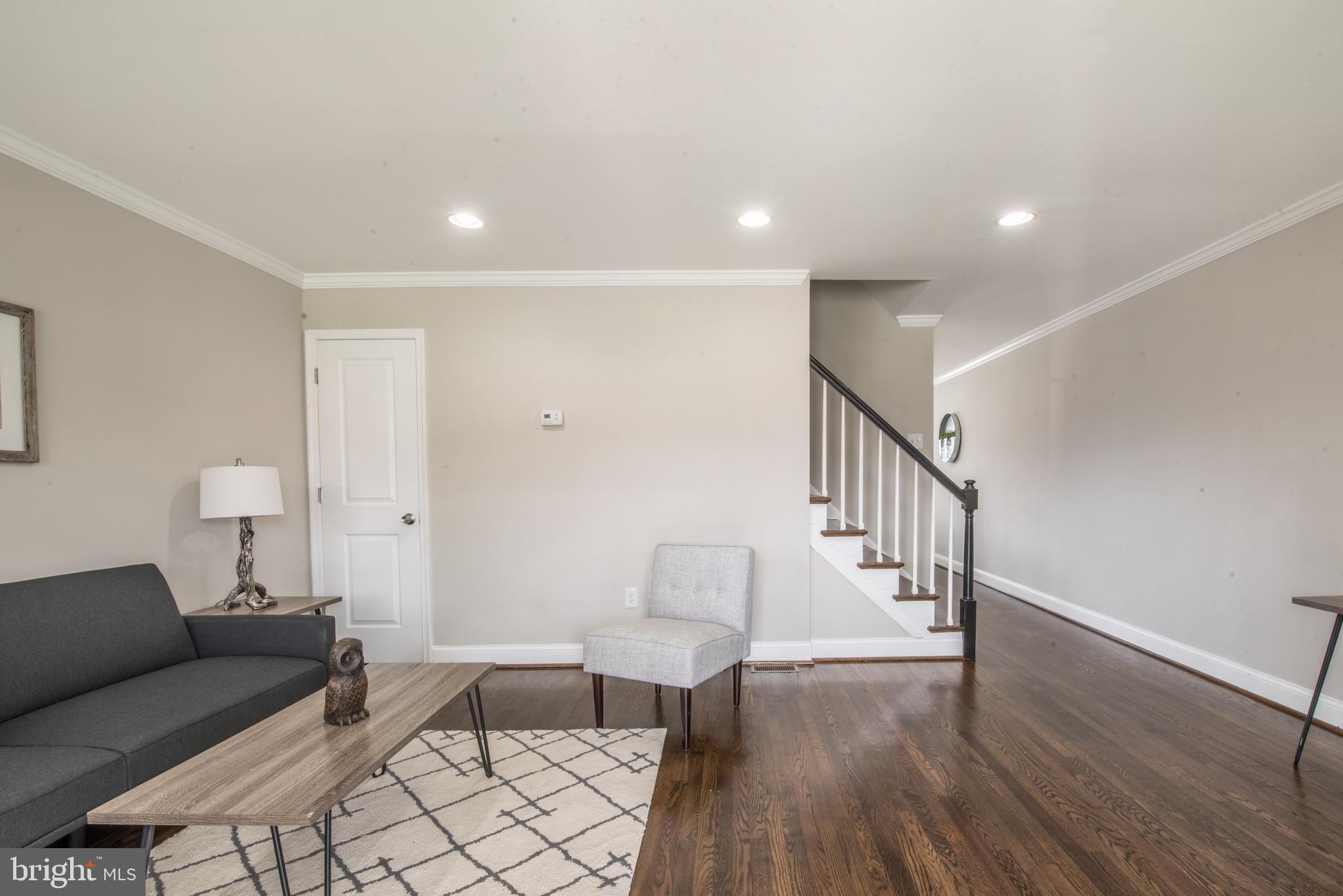 8149 Gray Haven Road Baltimore, MD 21222 - Photo 7 of 35 Living Room / Staircase