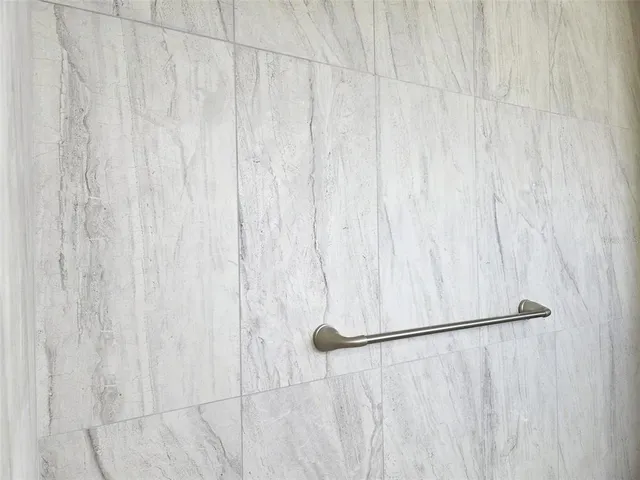 a view of a balcony with wooden floor