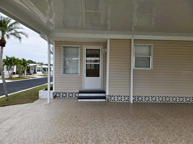 a view of a street with garage