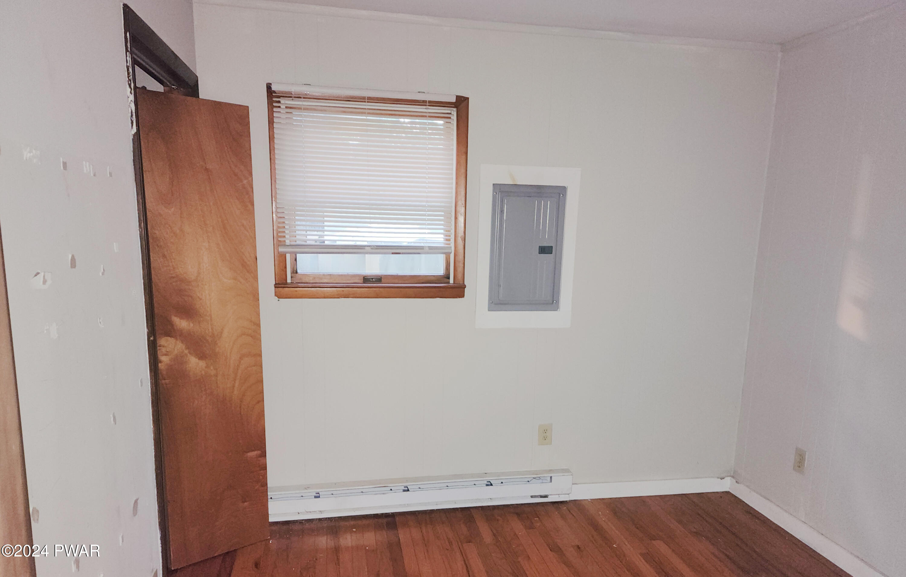 120 Slaymaker Road Milford, PA 18337 - Photo 14 of 28 an empty room with wooden floor and closet