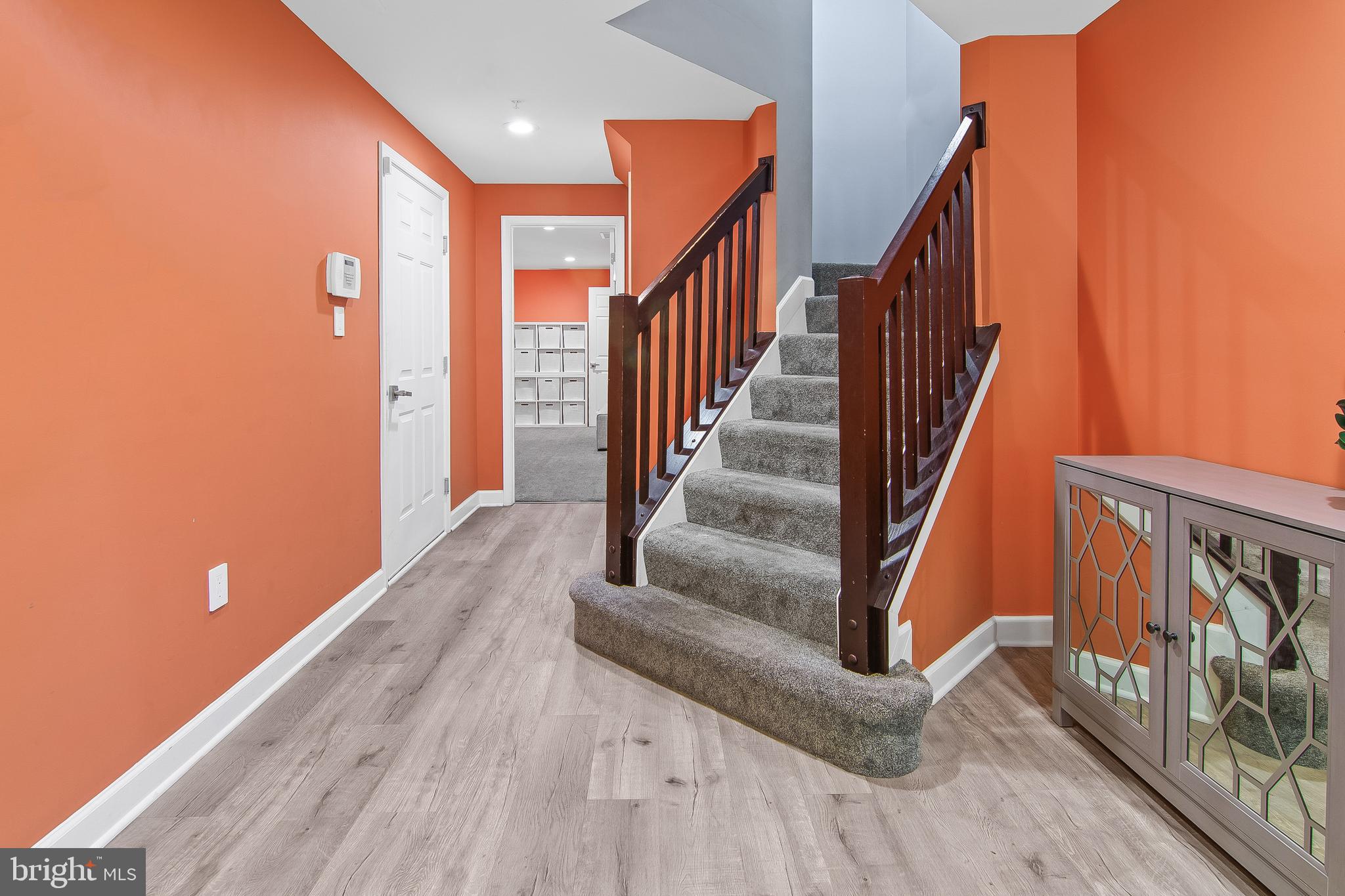 108 Lancefield Road Baltimore, MD 21209 - Photo 3 of 28 a view of entryway with wooden floor and stairs