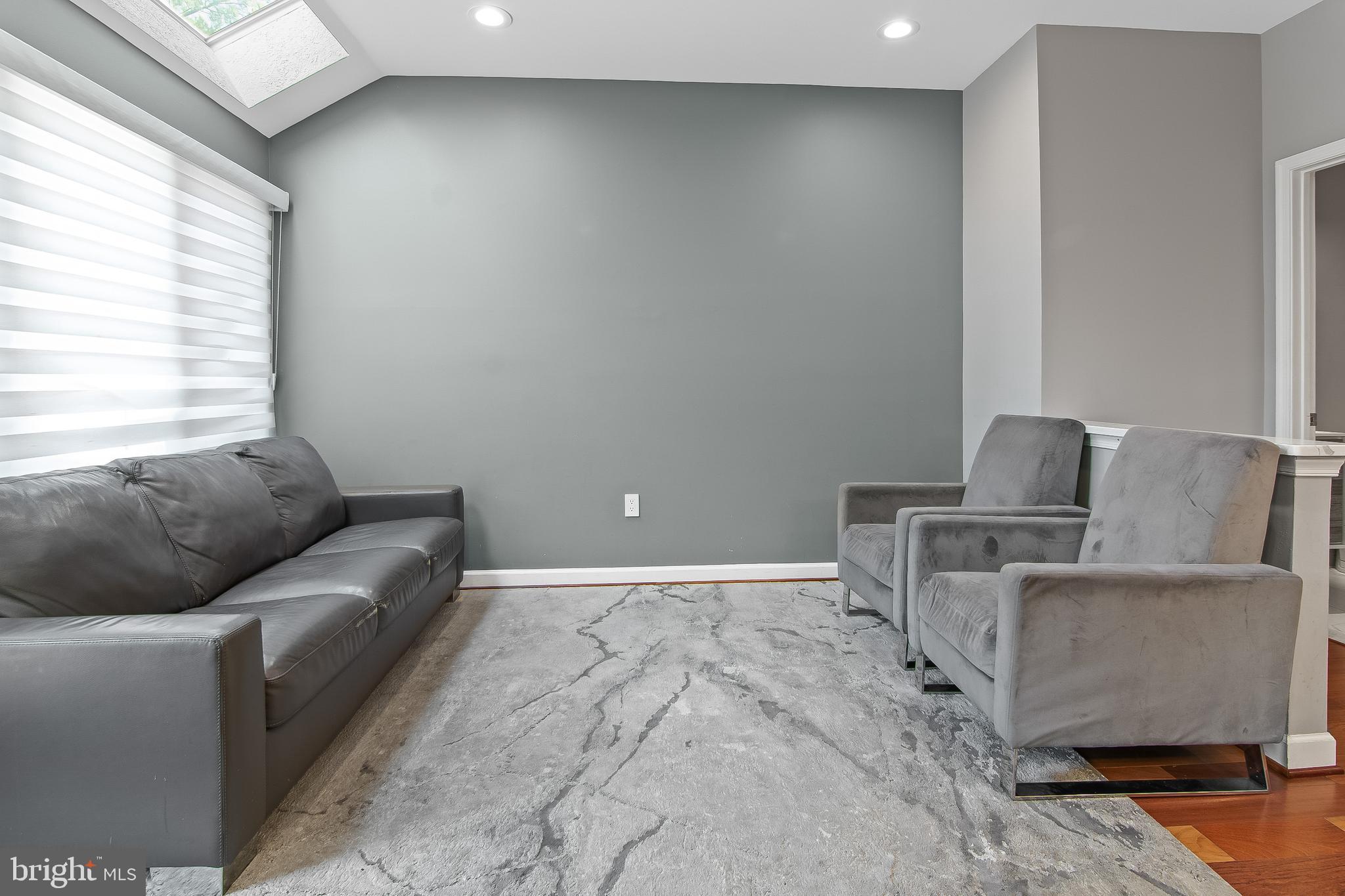 108 Lancefield Road Baltimore, MD 21209 - Photo 7 of 28 a living room with furniture and a window