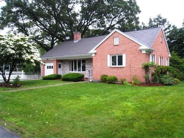 27 Hampden Road Framingham, MA 01702 - Photo 2 of 8 a front view of a house with yard and green space