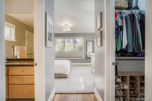 a view of a walk in closet and bedroom