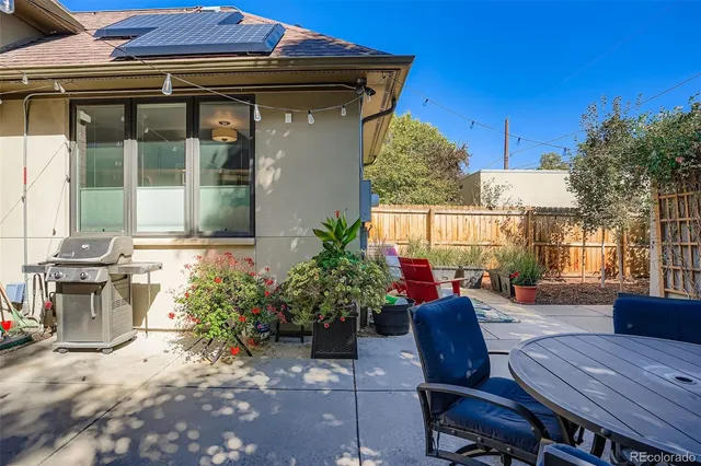a view of a house with sitting area and furniture