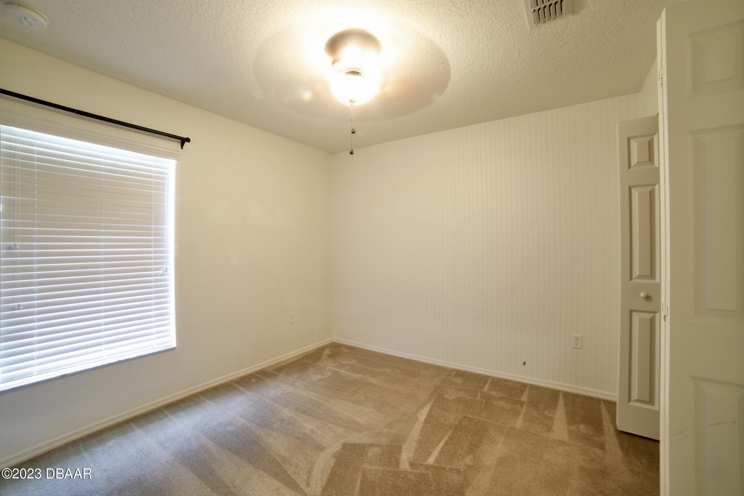 63 Levee Lane Ormond Beach, FL 32174 - Photo 9 of 41 a view of a room with a window