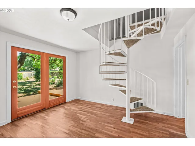 a view of entryway with wooden floor
