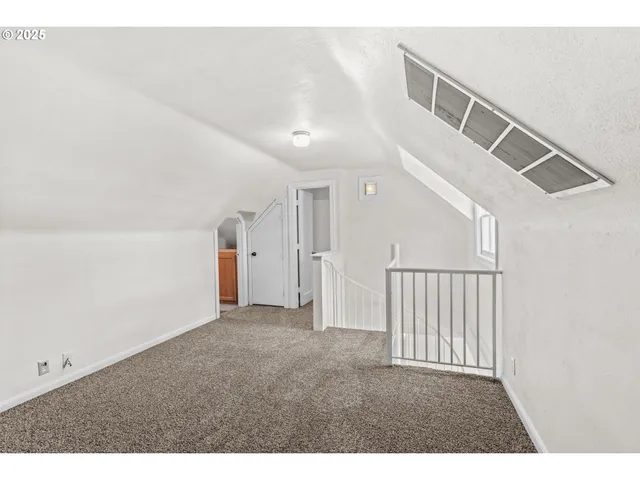 a view of hallway with stairs